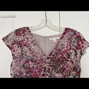 Dress with capped sleeves. 100% polyester.